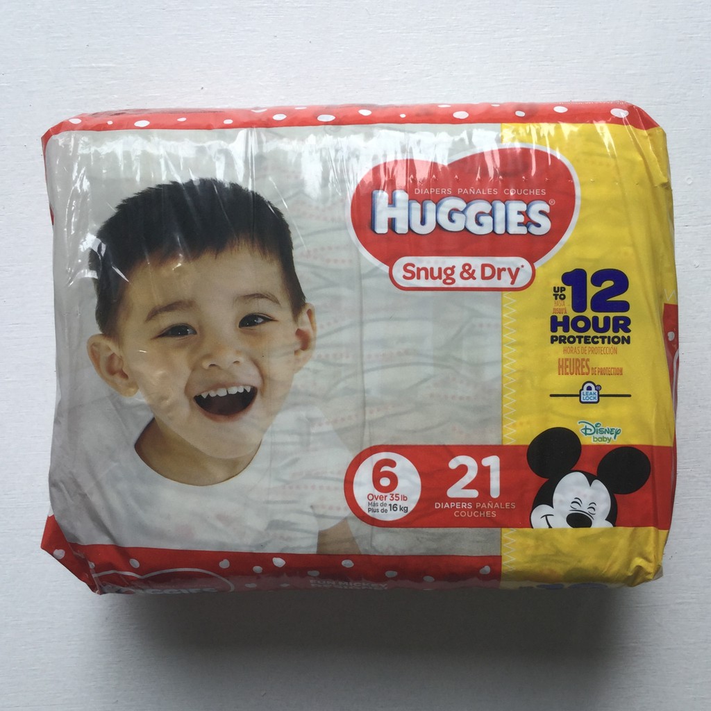 Huggies Couches Snug Dry + 16 Kg x 21